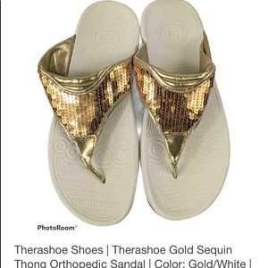 Size 6 gold sequined orthotics flip-flops.